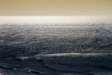 Deep Blue Sea II coastal canvas art print by Hausenflock Alan, featuring vibrant ocean waves and sunset hues.
