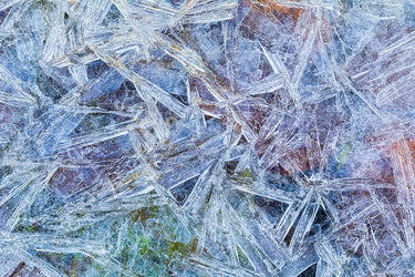 Abstract canvas art print featuring icy formations by Feeling at Home, created by Mahan Kathy, showcasing cool, textured ice-inspired artwork.