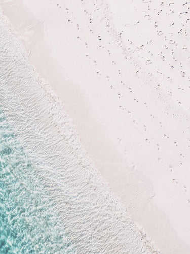 Feeling at Home coastal canvas art print featuring rosy footprints by Straatsma Leah, showcasing a serene beach scene.