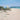 Feeling at Home coastal canvas art print featuring a relaxing day at the beach scene by Seslar Lin.