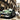 Cuban Cars II photography canvas art print by Feeling at Home featuring vintage Cuban cars on a scenic street scene.