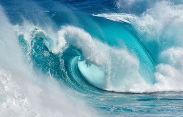 Coastal canvas art print by Feeling at Home titled "When the Ocean Turns into Blue Fire," featuring vibrant ocean and fire imagery.