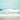 Coastal canvas art print featuring salty sea air scene by Feeling at Home, showcasing ocean waves and beach scenery.