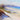 Coastal canvas art print of Port Stephans Beach Sands by Gercken Graham, featuring sandy shoreline and ocean waves.