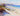Coastal canvas art print of Port Stephans Beach Sands by Gercken Graham, featuring sandy shoreline and ocean waves.