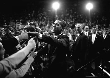 Feeling at home canvas art print of Barack Obama speaking at a campaign rally, featuring a vibrant photo of the former president.