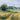 Landscape canvas art print by Loreth Lanie featuring a serene rural scene, part of the Feeling at Home collection.