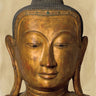 Golden Buddha canvas art print by Feeling at Home, featuring a serene Buddha image in warm tones, suitable for home decor.