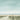 Coastal canvas art print titled Sunny Morning II by Paus Hans, featuring a serene seaside scene in soft, calming colors.