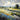 Blue field European canvas art print by Saunders Tom, featuring a serene landscape scene in vibrant colors.