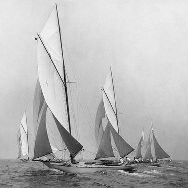 Vintage canvas art print of sailboats sailing downwind by Levick Edwin, showcasing classic maritime scene in a 1920s style.