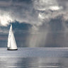 Coastal canvas art print of sailing on a silver sea by Feeling at Home, featuring a serene maritime scene in calming tones.