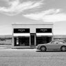 Black and white Marfa Texas fashion canvas art print by Lauren Julian, featuring a stylish, artistic cityscape scene.
