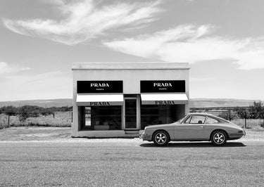 Black and white Marfa Texas fashion canvas art print by Lauren Julian, featuring a stylish, artistic cityscape scene.