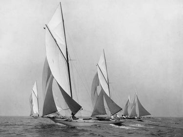 Vintage canvas art print of sailing boats downwind, created by Levick Edwin, showcasing early 20th-century maritime scene.