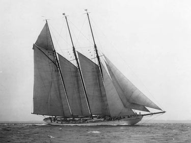 Vintage canvas art print of The Schooner Karina at sail by Levick Edwin, featuring a classic sailing ship scene.