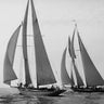 Vintage canvas art print of sailboats racing during a yacht club cruise by Levick Edwin, titled "Feeling at Home."