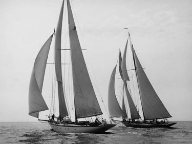 Vintage canvas art print of sailboats racing during a yacht club cruise by Levick Edwin, titled "Feeling at Home."