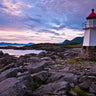 Lighthouse on the Norwegian coast in Lofoten, framed as a Feeling at Home art print by Frank Assaf, showcasing coastal scenery.