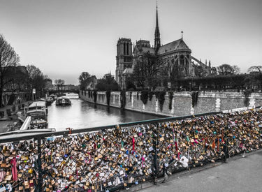 European canvas art print of Pont des Arts bridge with love padlocks in Paris by Frank Assaf, showcasing the iconic scene.