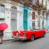 Woman with red umbrella beside vintage car on Havana street, framed art print by Frank Assaf, Feeling at Home.