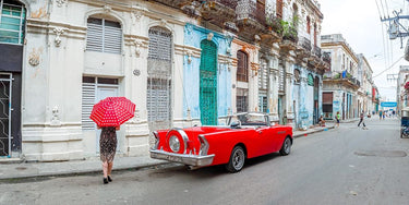 Canvas Art Print Woman with red umbrella by a vintage car on the street of Havana, Cuba, FTBR 1851 Photography subject by Frank Assaf Fine Art Print quality