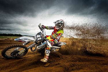 Motocross curves on the ground travel canvas art print by Devos Delphine, featuring dynamic motorcycle tracks on textured canvas surface.