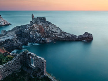 Coastal canvas art print of Portovenere Italy sunset by Van Deelen Ellen, featuring vibrant colors and scenic coastal views.