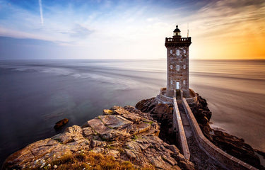 Coastal canvas art print "Phare de Kermorvan II" by Meikle de Vlas Petra, featuring a lighthouse scene in soft tones.