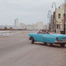 Havana Malecón photography canvas art print by Feeling at Home, featuring vibrant seaside cityscape with waves and historic architecture.
