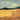 Gold glitter countryside landscape art print by Nari K on canvas, featuring a serene rural scene with golden accents.
