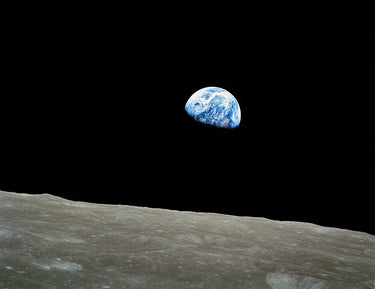 Space landscape canvas art print of planet Earth viewed from the moon, by Feeling at Home, showcasing a cosmic scene with detailed planetary imagery.