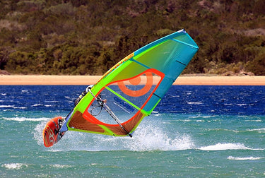 Sea and coastal landscape art print by Feeling at Home featuring wind surfer and sailing scenes on canvas, inspired by Sardinia.