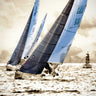 Coastal canvas art print featuring racing waters scene by Hausenflock Alan, framed and displayed for a home decor setting.