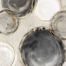 Abstract canvas art print featuring black rings by Feeling at Home, with soft colors and modern design, suitable for contemporary decor.