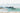 Emerald Waters landscape canvas art print by Reeves Tom, featuring vibrant green and blue hues of a serene water scene.