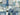Blue urban abstraction art print by Reeves Tom, abstract canvas artwork with vibrant blue and textured cityscape design.