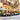 Feeling at Home Cafe Italia photography canvas art print by Navas Emily, featuring a scenic Italian café scene on textured canvas.