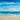 Coastal canvas art print of crashing waves by DeRice Julie, featuring vibrant ocean scenery in a Feeling at Home design.