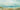 Serenity on the Beach coastal canvas art print by Vassileva Silvia, depicting a tranquil beach scene with soft colors and calming ocean view