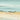 Coastal canvas art print titled "Day Break I" by Feeling at Home, featuring a serene seaside scene with soft morning light.