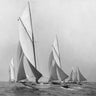 Vintage canvas art print of sailboats sailing downwind by Levick Edwin, showcasing classic maritime scene in a 1920s style.