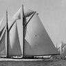 Vintage canvas art print of a schooner race by Levick Edwin, featuring a classic maritime scene for nautical decor.