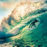 Coastal canvas art print of surfing at sunset in Australia by Feeling at Home, featuring vibrant ocean waves and sunset sky.
