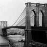 Vintage canvas art print of the Brooklyn Bridge in New York, featuring 1900-style architecture by Loeffler A. for Feeling at Home.