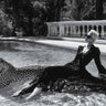 Relaxing by the Pool Animals canvas art print by Feeling at Home featuring colorful animals lounging near a pool.