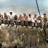 Colorized art print of "Lunch atop a Skyscraper" by Ebbets Charles C., showing workers seated on a steel beam high above New York City.