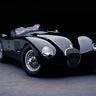 1951 Jaguar C-Type transportation canvas art print by Feeling at Home, featuring vintage car artwork on textured canvas.
