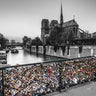 European canvas art print of Pont des Arts bridge with love padlocks in Paris by Frank Assaf, showcasing the iconic scene.