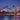 Coastal canvas art print of London skyline over the River Thames by Frank Assaf, featuring urban cityscape and water reflections.